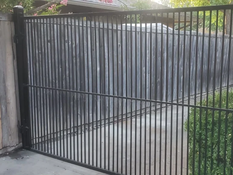 Modern driveway gate installed in Richardson, TX with sleek 2025 design and smart access technology