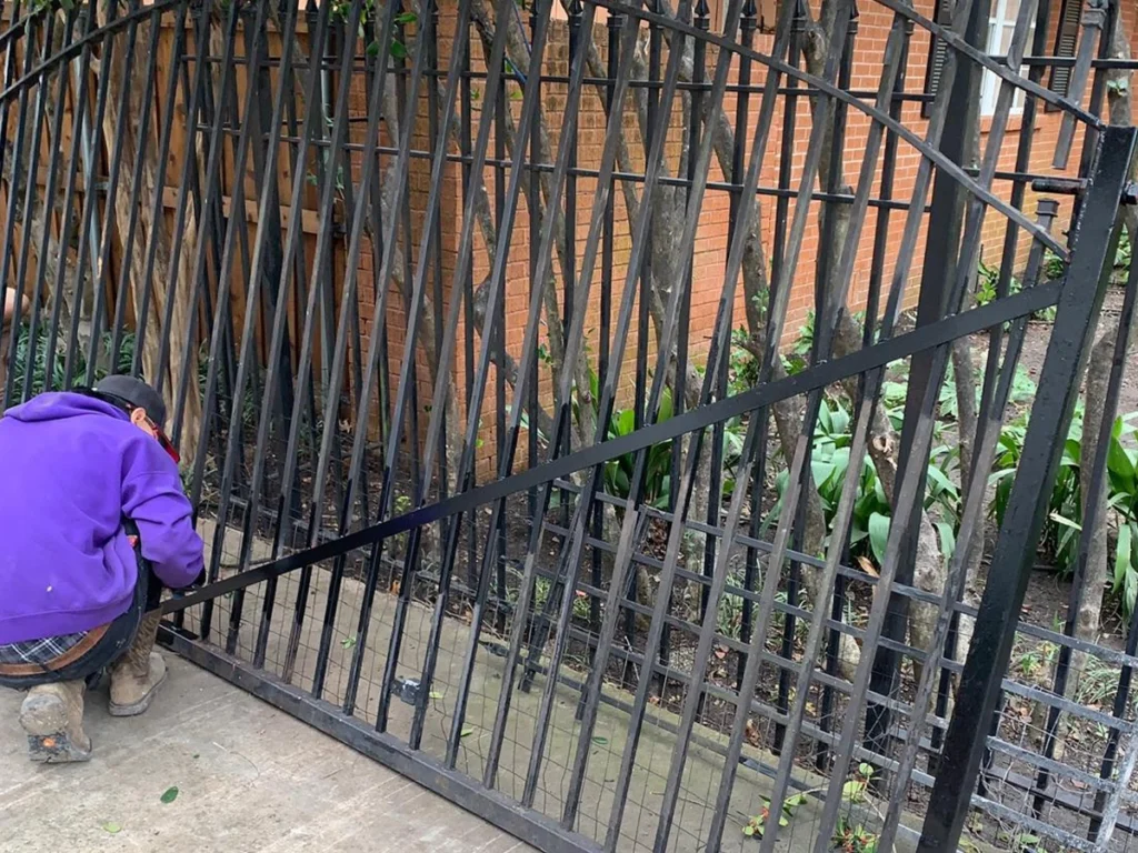 Elegant wrought iron gate installed at a residential property in Carrollton, TX