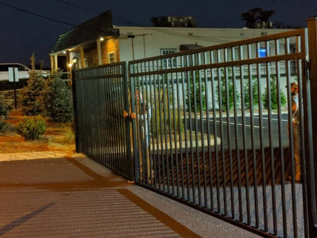 Professional commercial swing gate installer in Frisco, TX by Everlast Gates & Fence