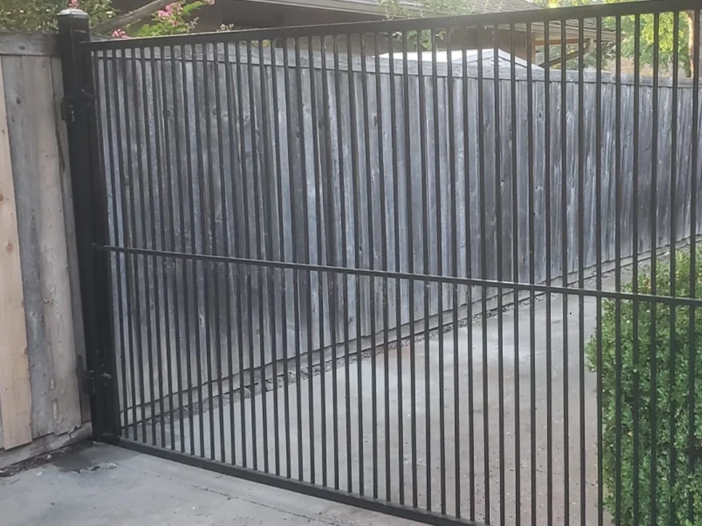 Modern custom commercial entry gate installed by Everlast Gates & Fence in Fort Worth, Texas