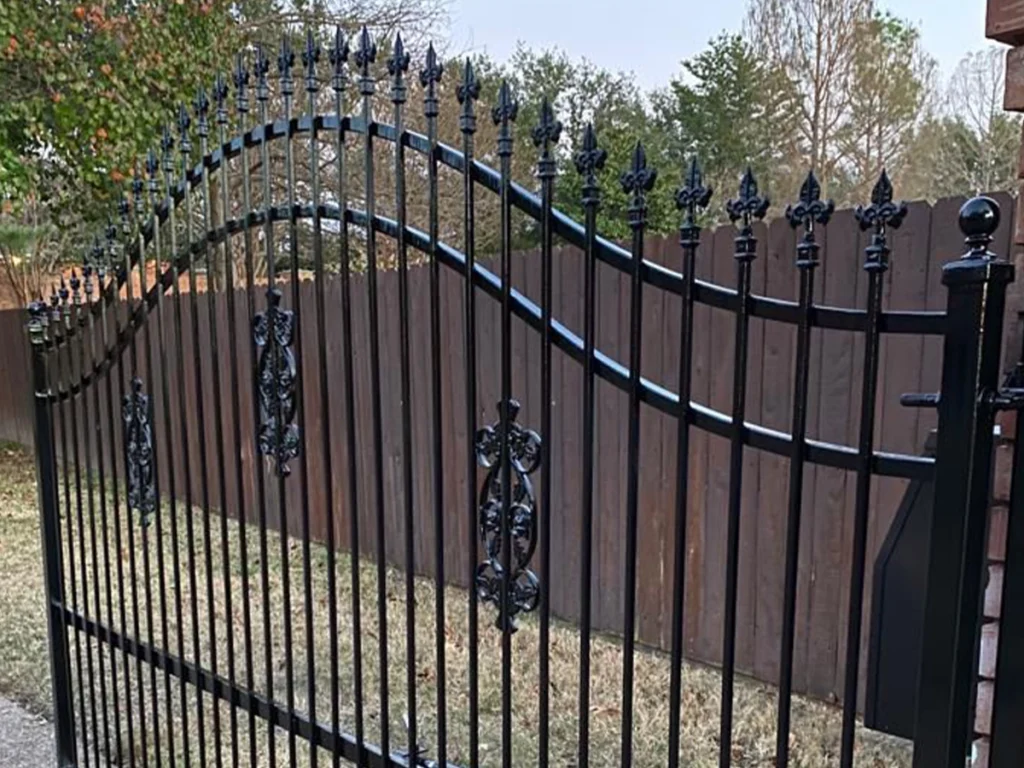 A beautifully designed custom gate in Dallas enhancing the curb appeal of a modern home.