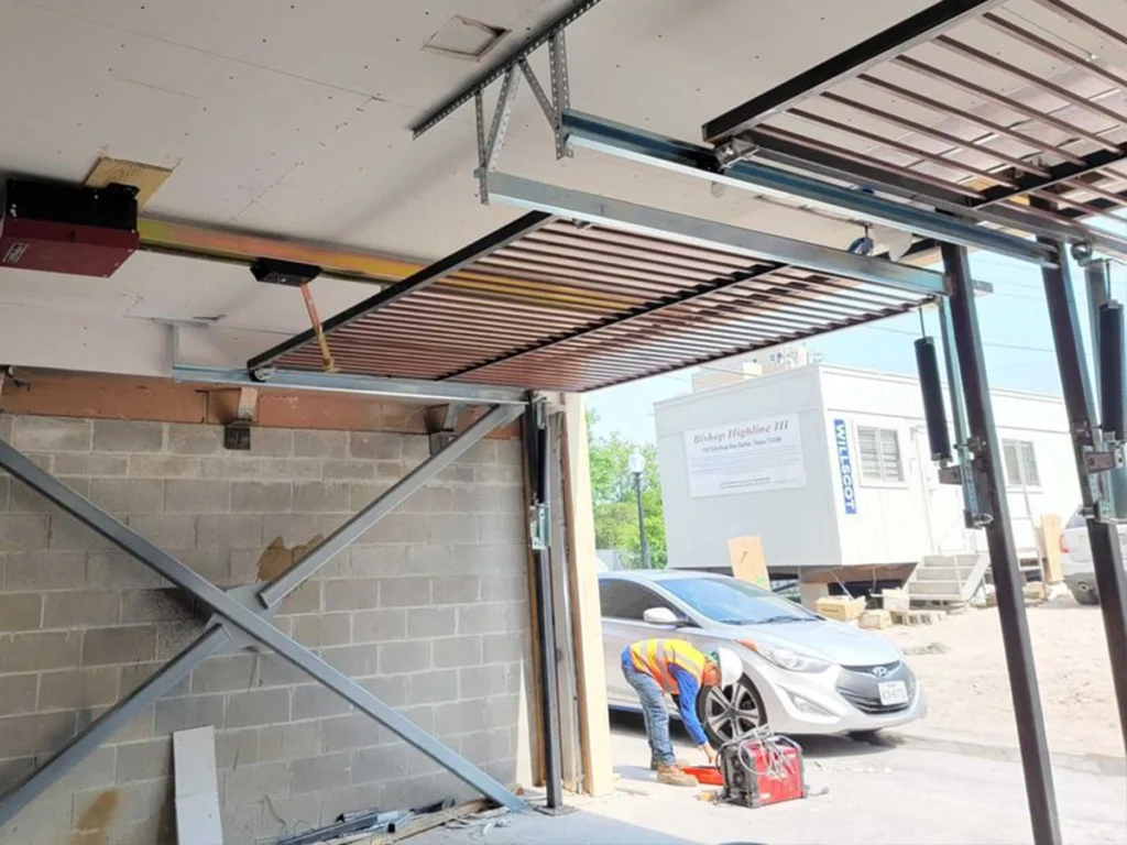 Custom metal gate installation in Garland by Everlast Gates & Fence