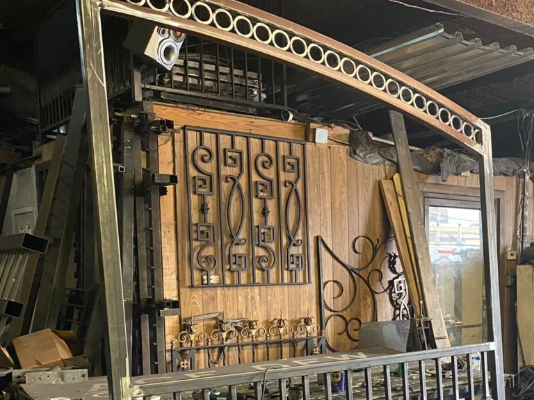 Custom iron gate installed by Everlast Gates & Fence at a luxury home in Southlake, TX