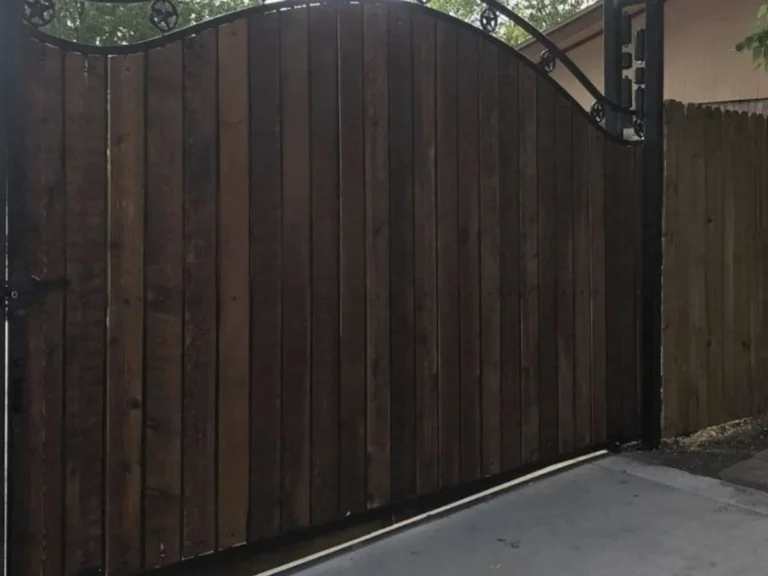 Custom cedar wood gate installed at a Dallas residential property