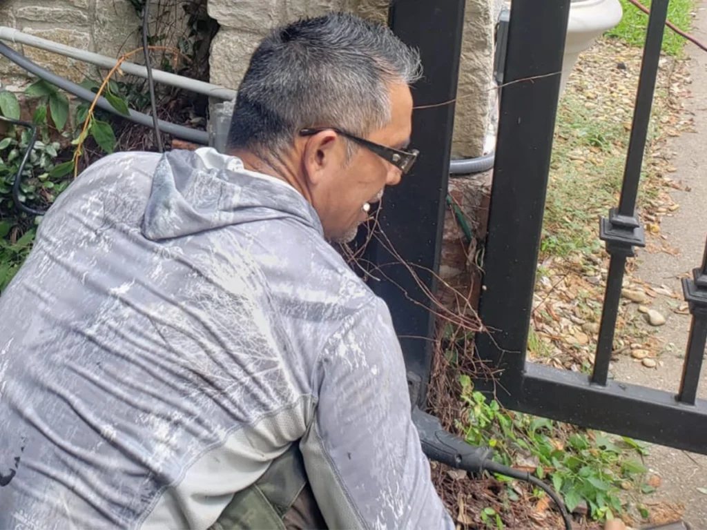 Wylie residential gate showing signs of damage and rust