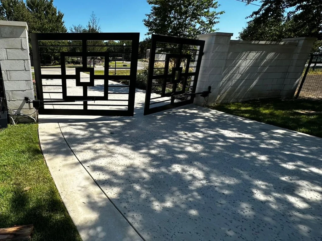 Smart technology and eco-friendly materials in driveway gate innovations for Garland residents.