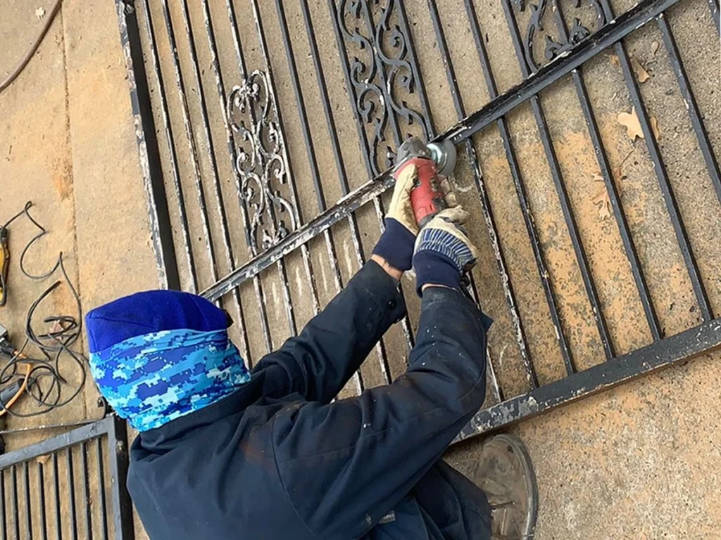 Elegant iron fence enhancing a Farmers Branch home’s curb appeal.