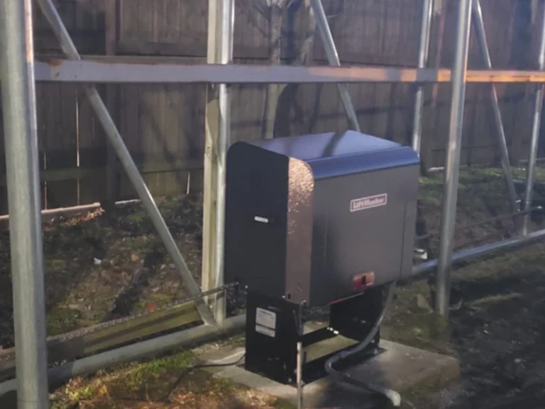 Modern electric gate installed in Richardson, TX home by Everlast Gates & Fence