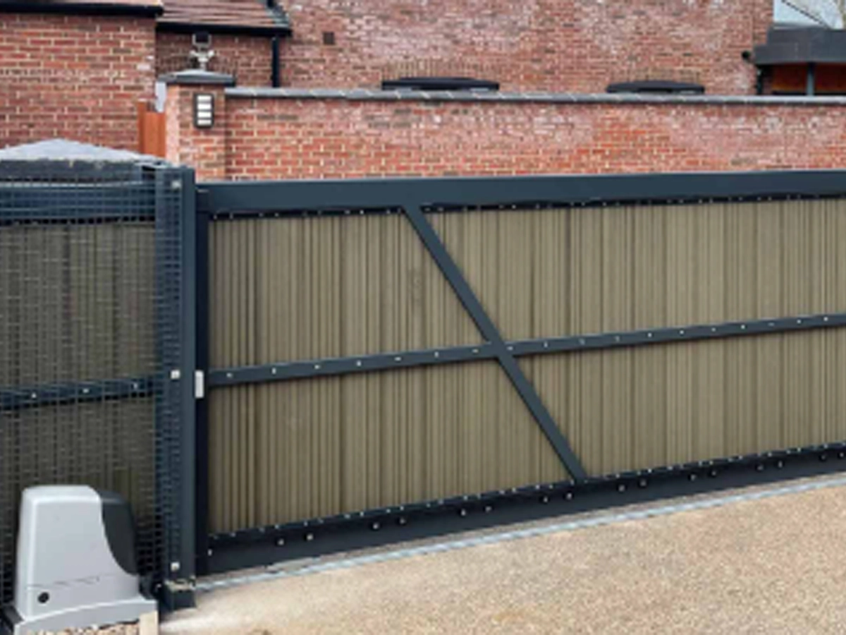 Electric driveway gate systems securing a Houston property entrance