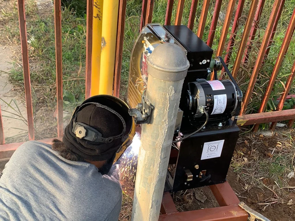 Electric gate with modern design in a residential setting, showcasing smooth operation and pristine condition.