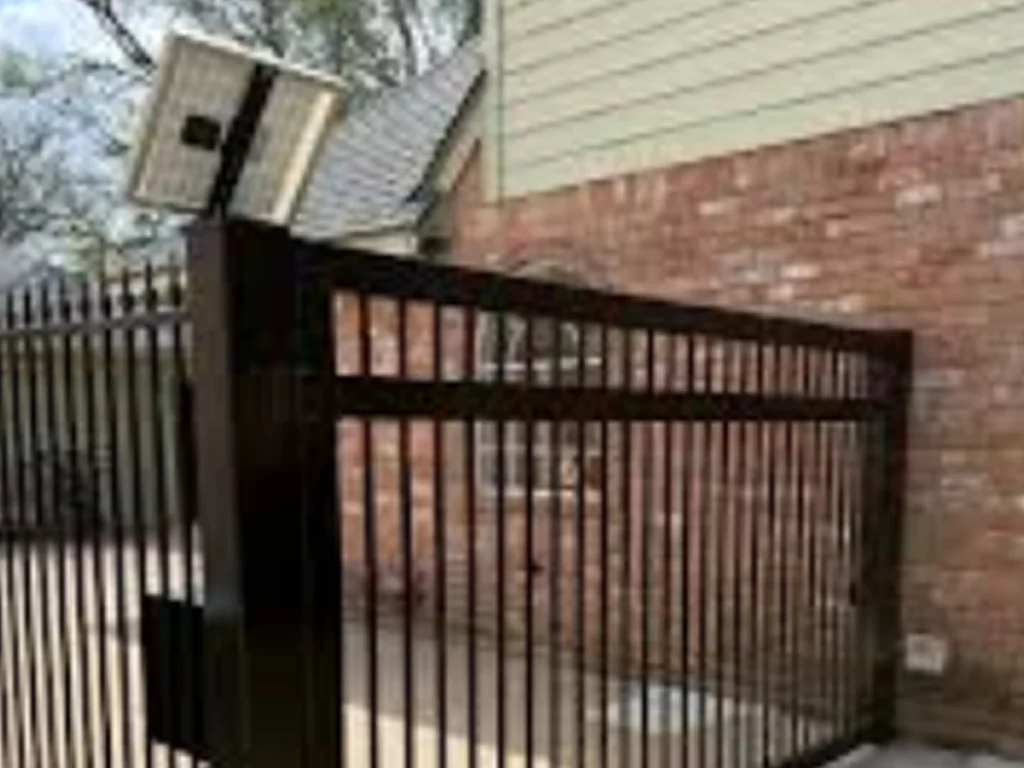 entryway with a solar gate that’s built for security at a Wylie home