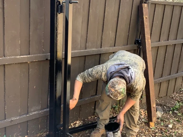 Professional wood gate installation in Plano by Everlast Gates & Fence