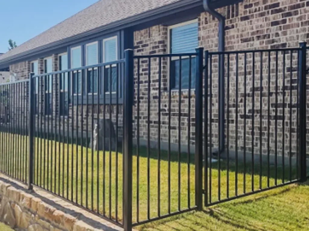 Fort Worth iron fence installation by Everlast Gates & Fence