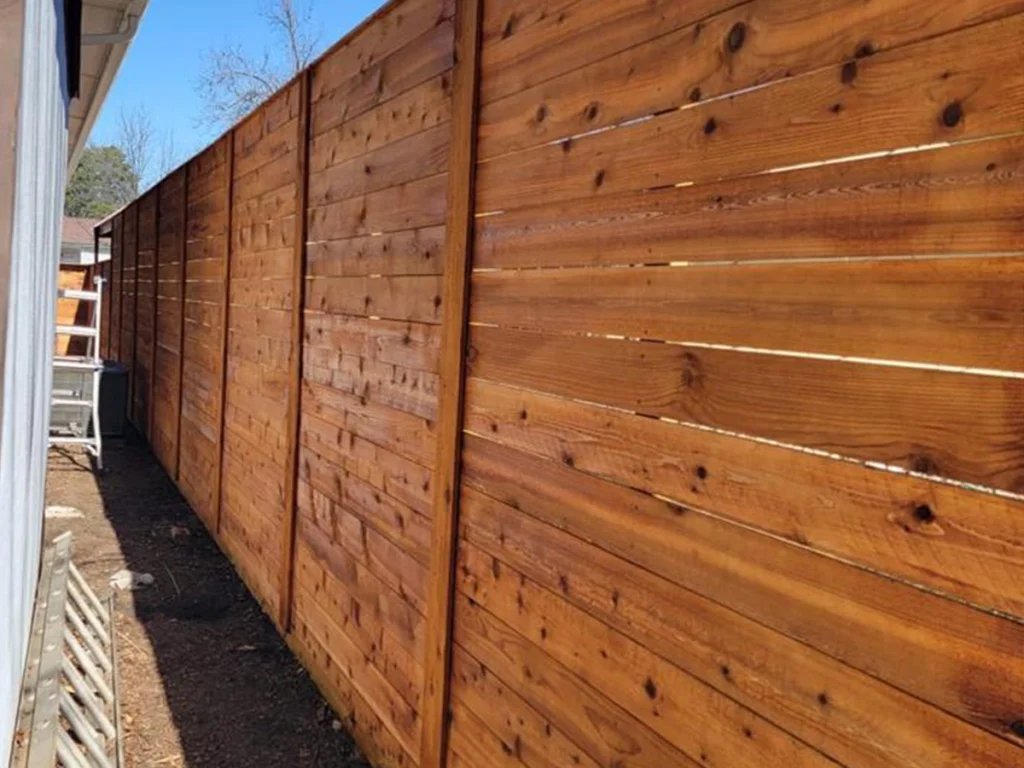 Professional wood fence installation in Plano by Everlast Gates & Fence