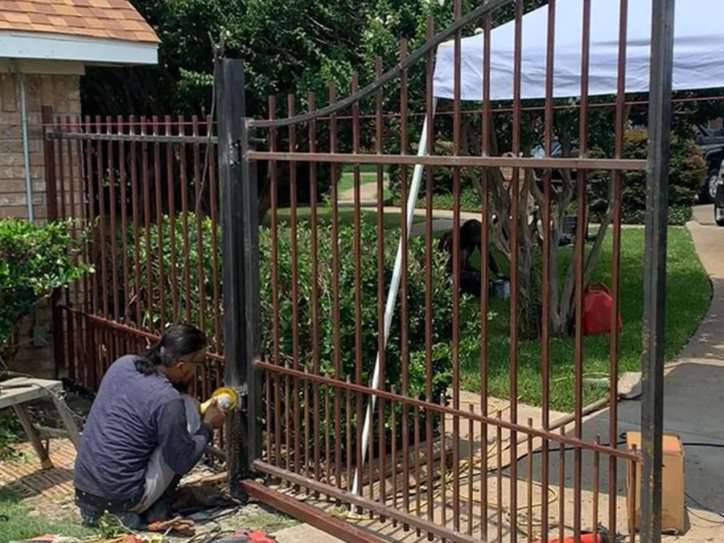 Farmers Branch iron gate installation by Everlast Gates & Fence expert team