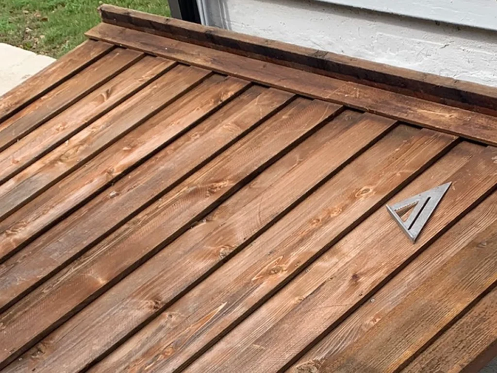 Wooden gate installation in Farmers Branch by Everlast Gates & Fence