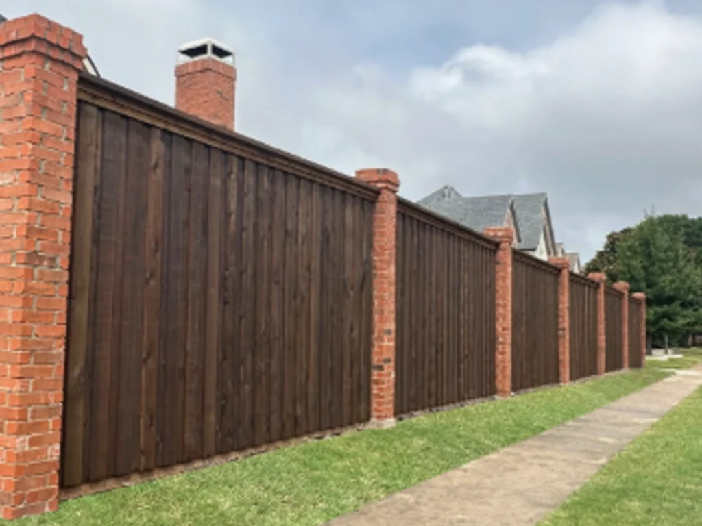 Fence Sections Shift Over Time beside a Carrollton yard with leaning posts