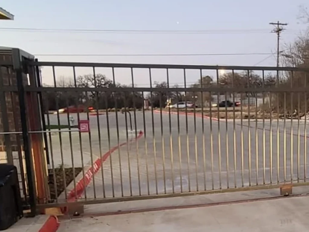 Modern commercial sliding gate installed by Everlast Gates & Fence in Fort Worth, TX