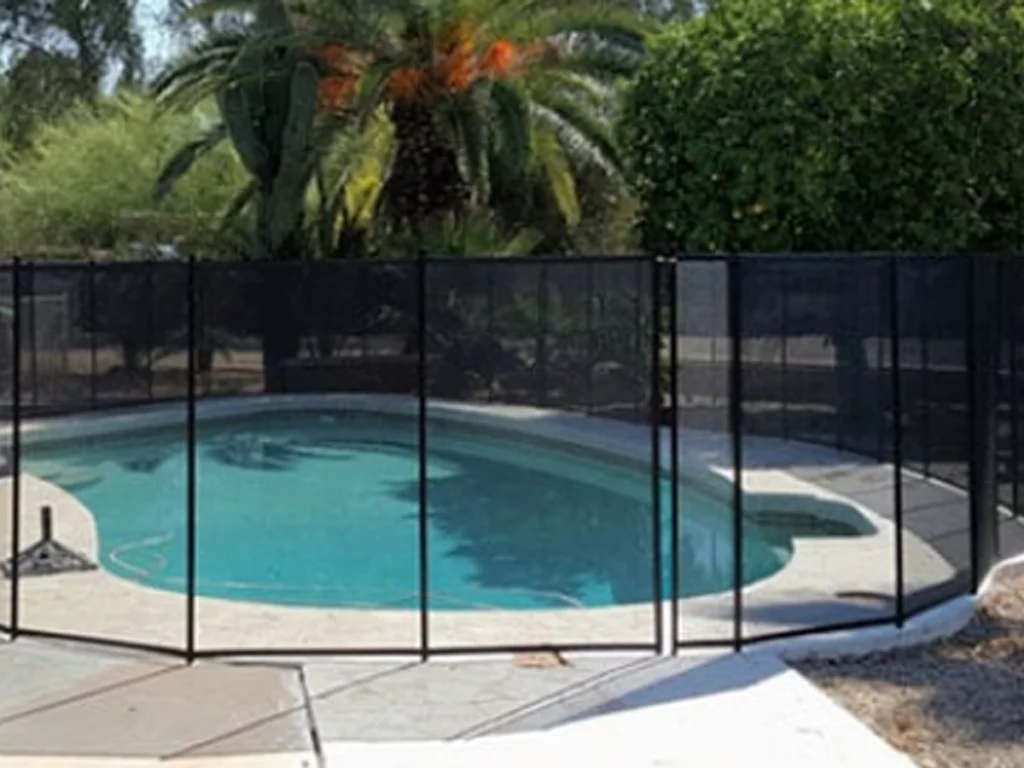 Fort Worth pool fences around a safe backyard pool with a secure gate