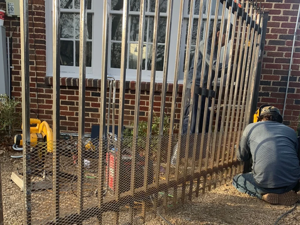 Secure driveway gate in a Houston home after professional repair