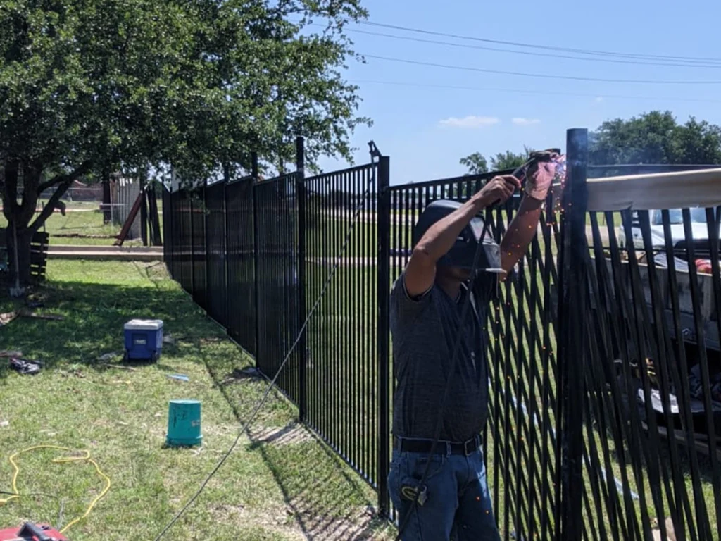 Iron fence installation by Everlast Gates in Farmers Branch, showcasing quality craftsmanship and durability.
