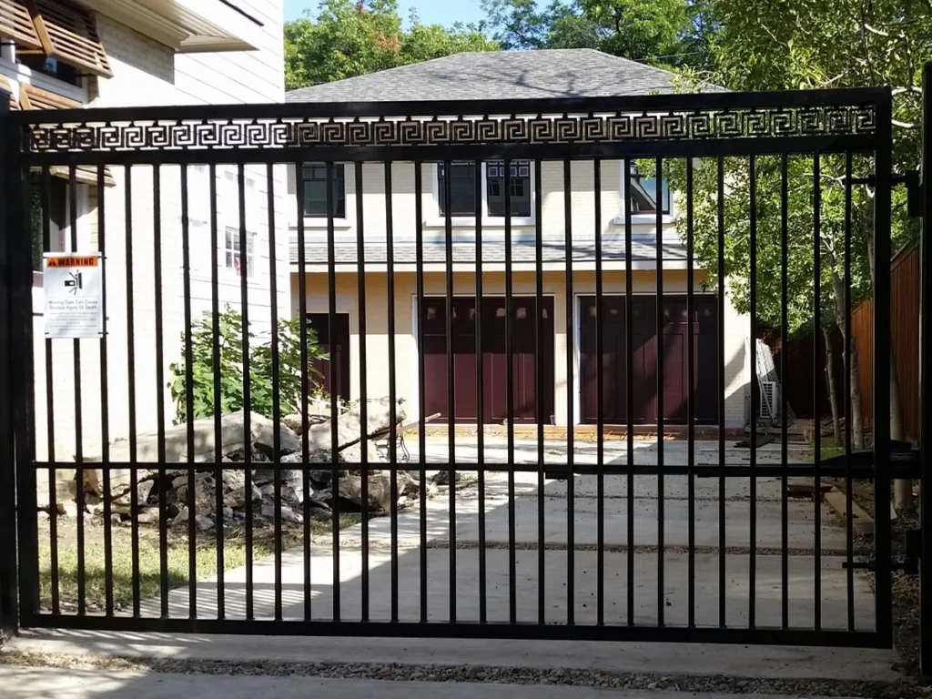 A custom-designed gate installed on a Fort Worth property, highlighting modern style and security.