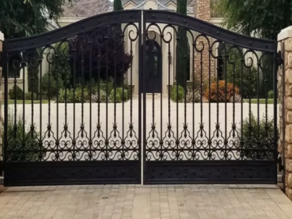 modern iron gate installation in Plano at a stylish residential driveway