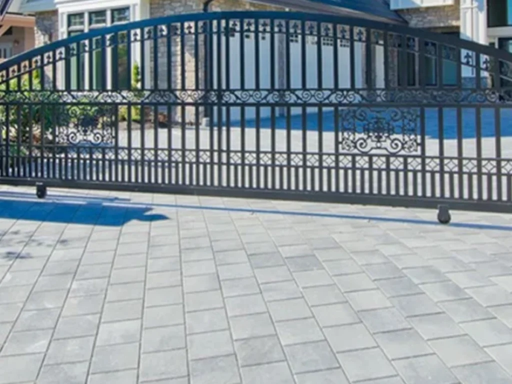 Modern sliding gate installed at a Fort Worth residential property by Everlast Gates & Fence