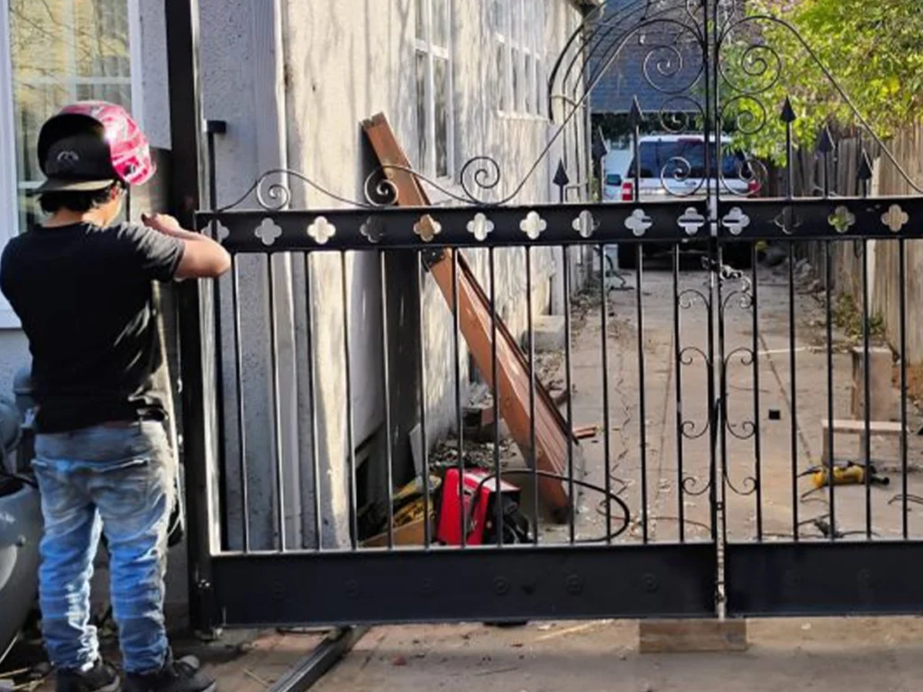 Technician performing Electric Gate Installation Service in Richardson, TX