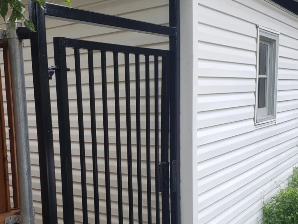 Metal Gate Installation in Garland TX by Everlast Gates & Fence