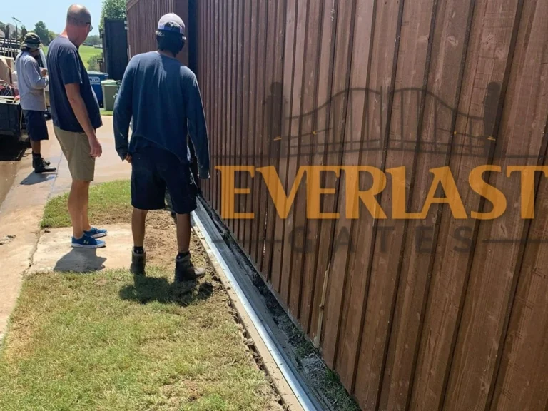 Technician performing quality gate repair on a residential property in Wylie, TX