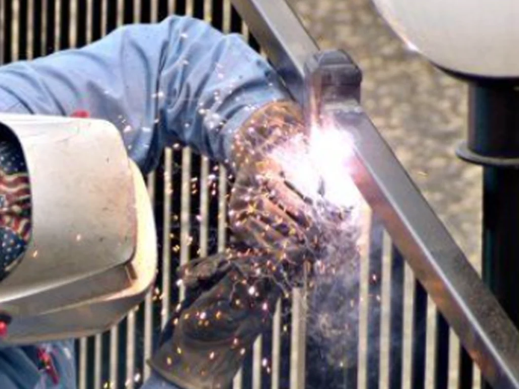 Reinforcing metal gates with professional welding to restore strength and stability in a Wylie driveway entrance