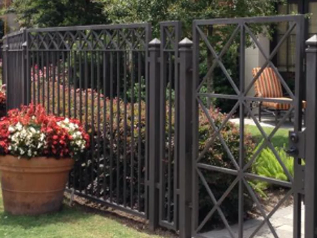 Residential Fence Gate Installation crew preparing a Houston yard for gate posts
