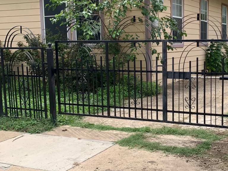 Elegant iron gate installed by Everlast Gates & Fence in Wylie, TX