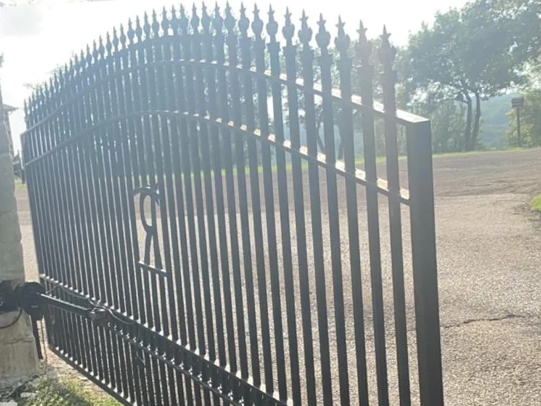 Modern sleek and minimalist iron gate installed at a Southlake residence