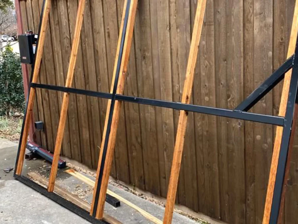 Modern sliding gate in Garland home installed by Everlast Gates & Fence