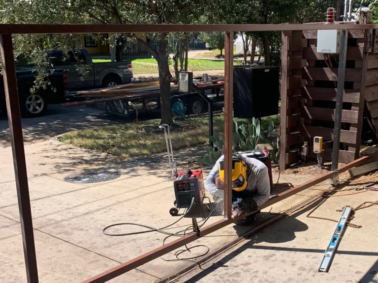 Modern sliding gate installation in Dallas by Everlast Gates & Fence.