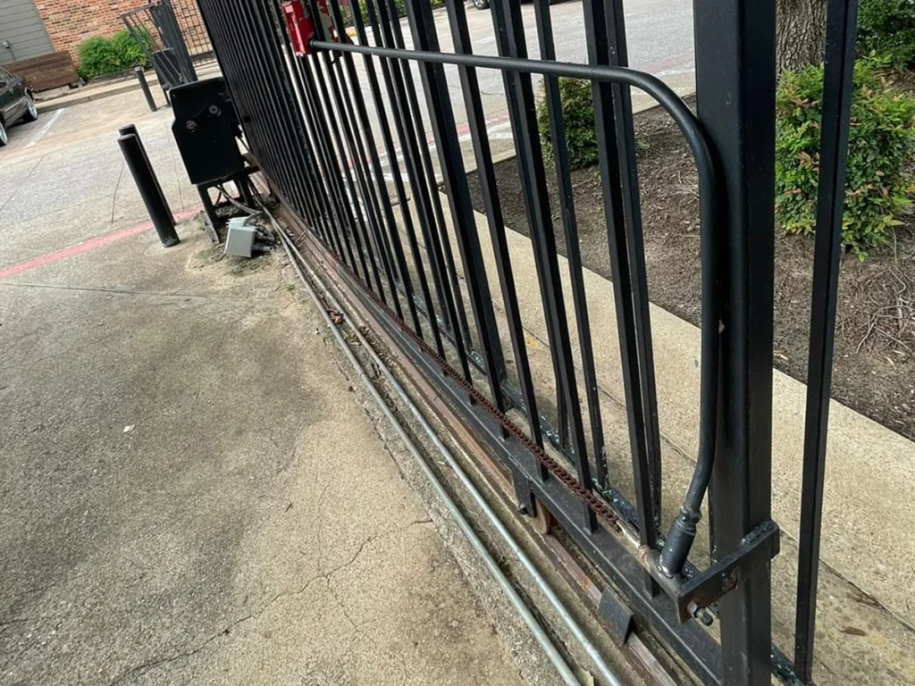 Well-maintained sliding gate in a residential Frisco home.