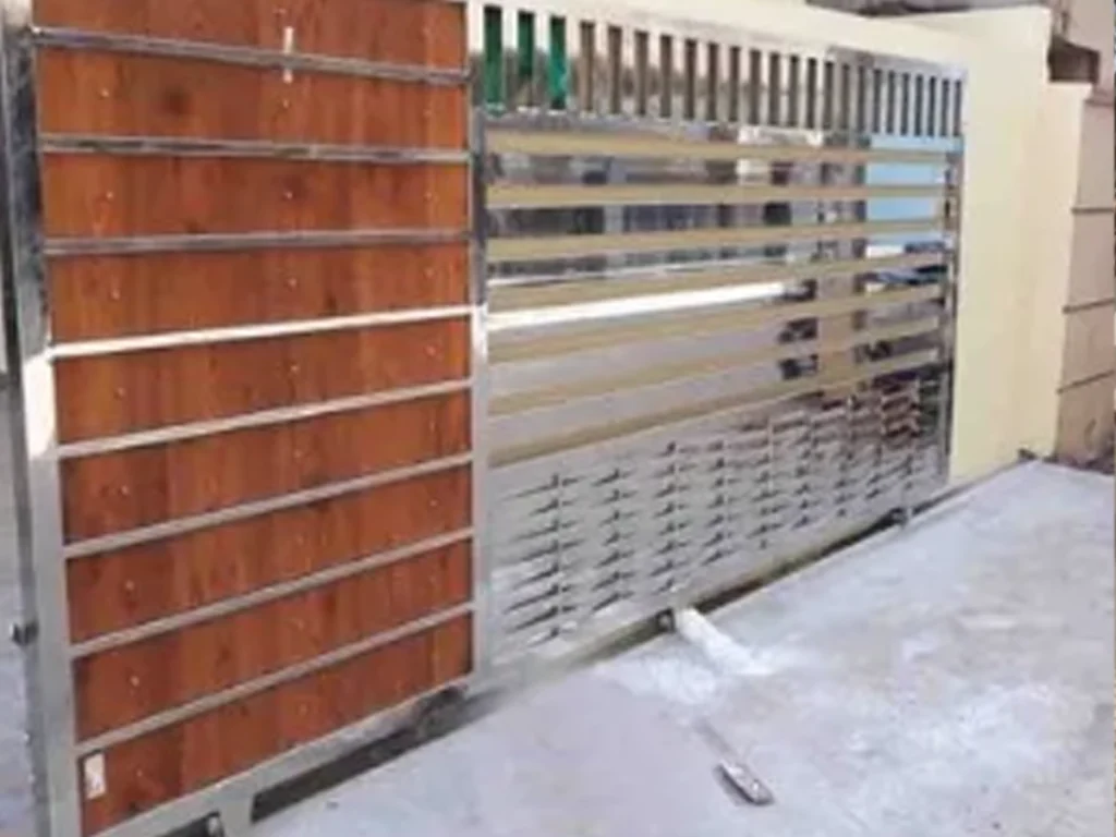 Sliding iron gate Plano home entrance with custom design