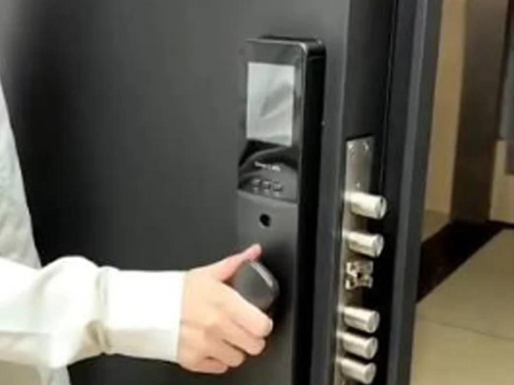 Smart gate intercom with RFID video monitoring and remote unlocking installed at a modern Plano driveway