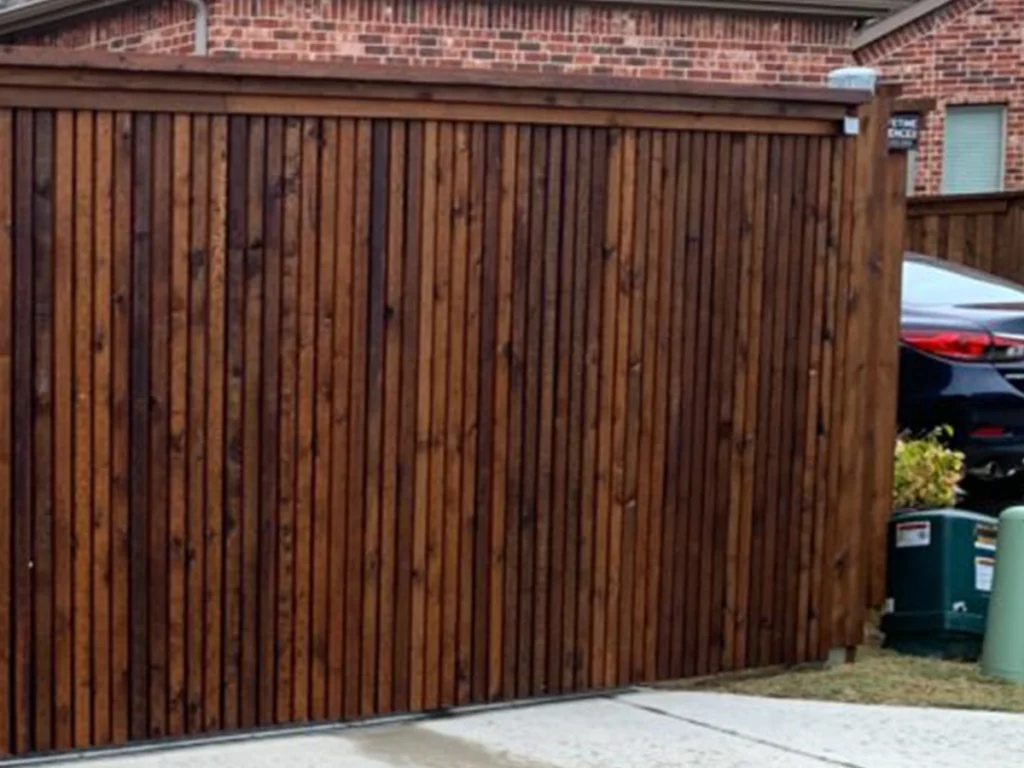 Wood gate installation in Frisco for stronger home security this fall