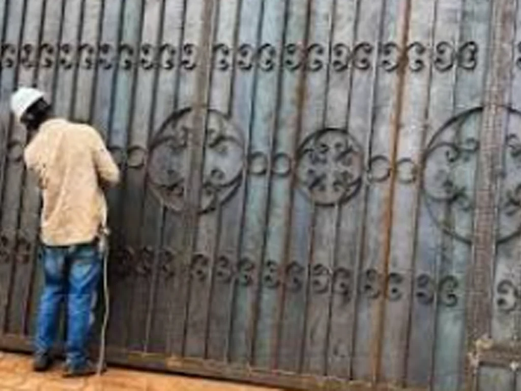 Strong welds securing a residential metal gate entrance in Richardson TX