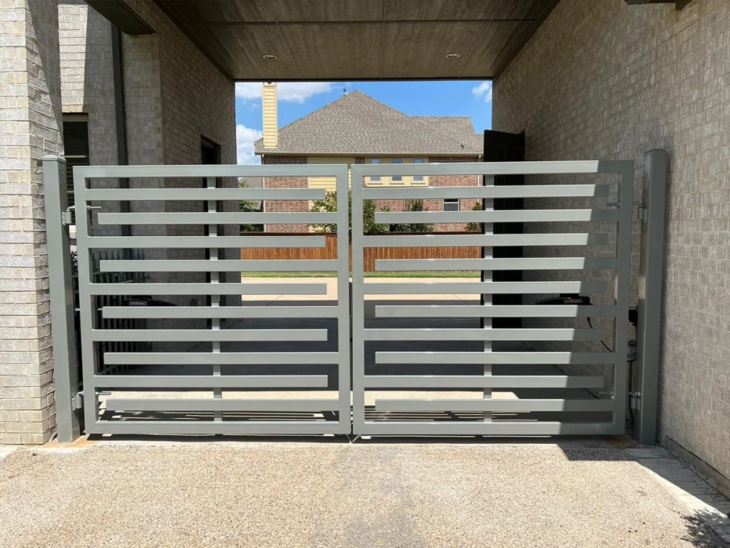 Stunning driveway gate enhancing home security and curb appeal in Frisco, TX.
