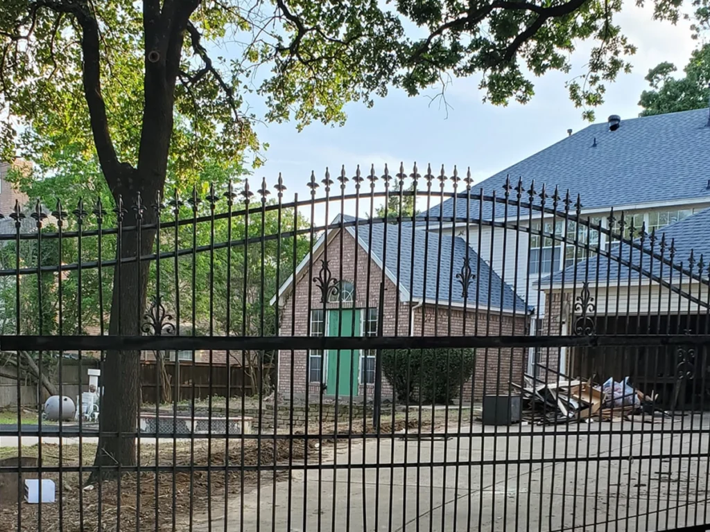 Stunning modern driveway gate installed by Everlast Gates & Fence in Southlake, TX
