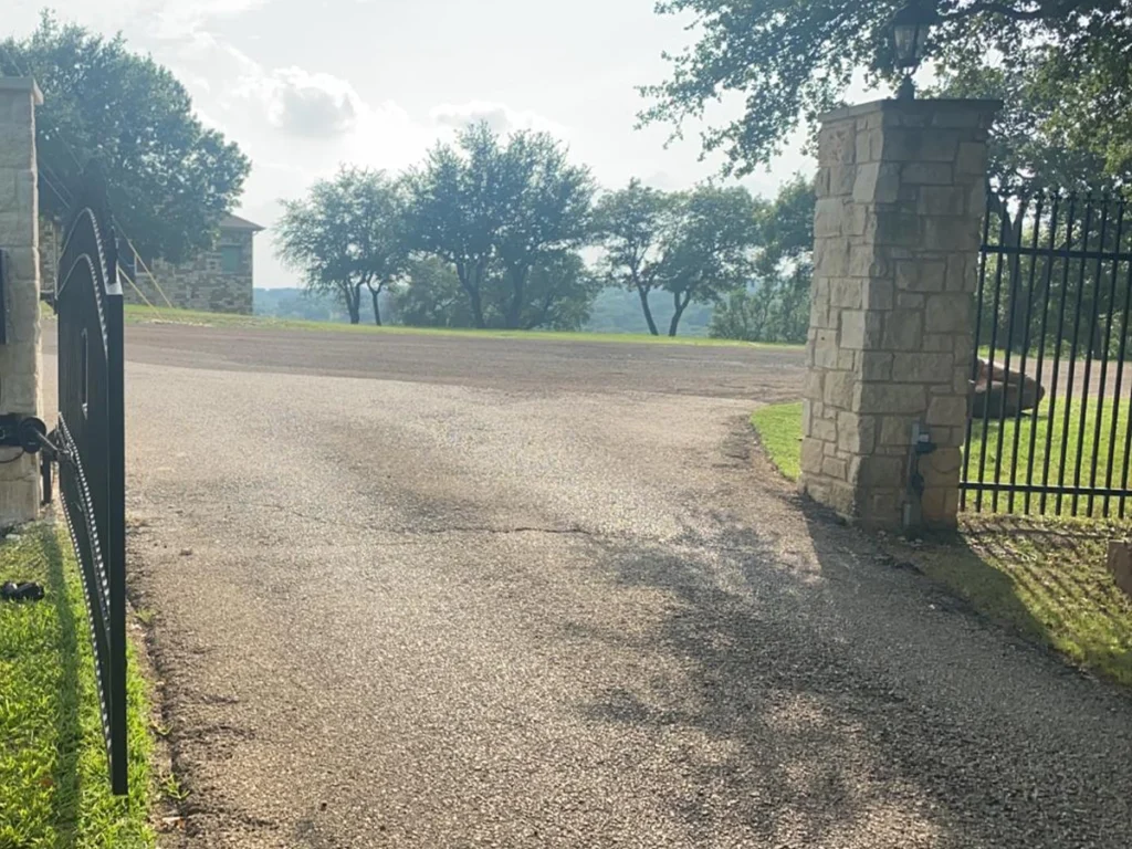 Elegant driveway gate installed by Everlast Gates & Fence in Fort Worth, TX.