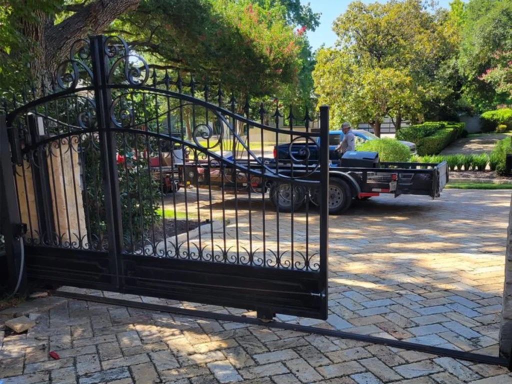 Modern sliding gate installation in Southlake by Everlast Gates & Fence