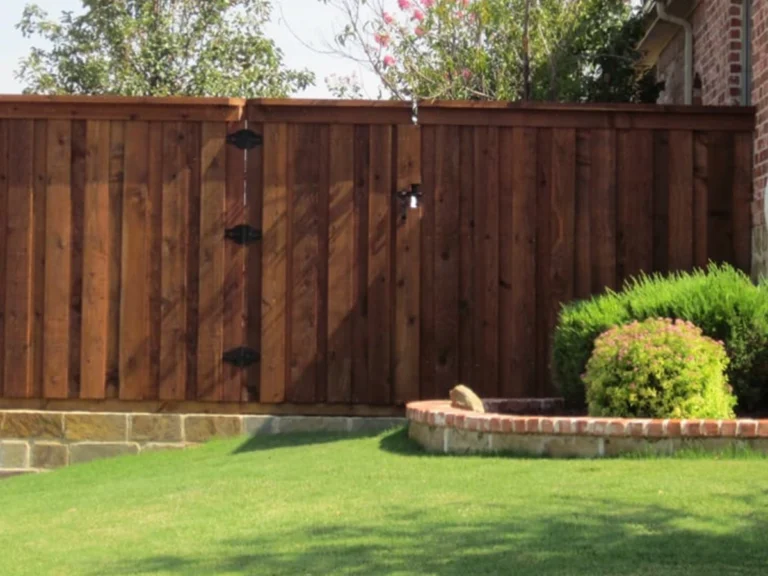Classic wood gate installation by Everlast Gates & Fence in Houston