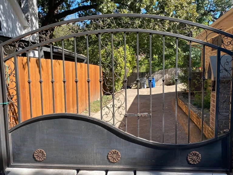Modern iron gate installed at a Richardson home in 2025 with sleek design and smart access features