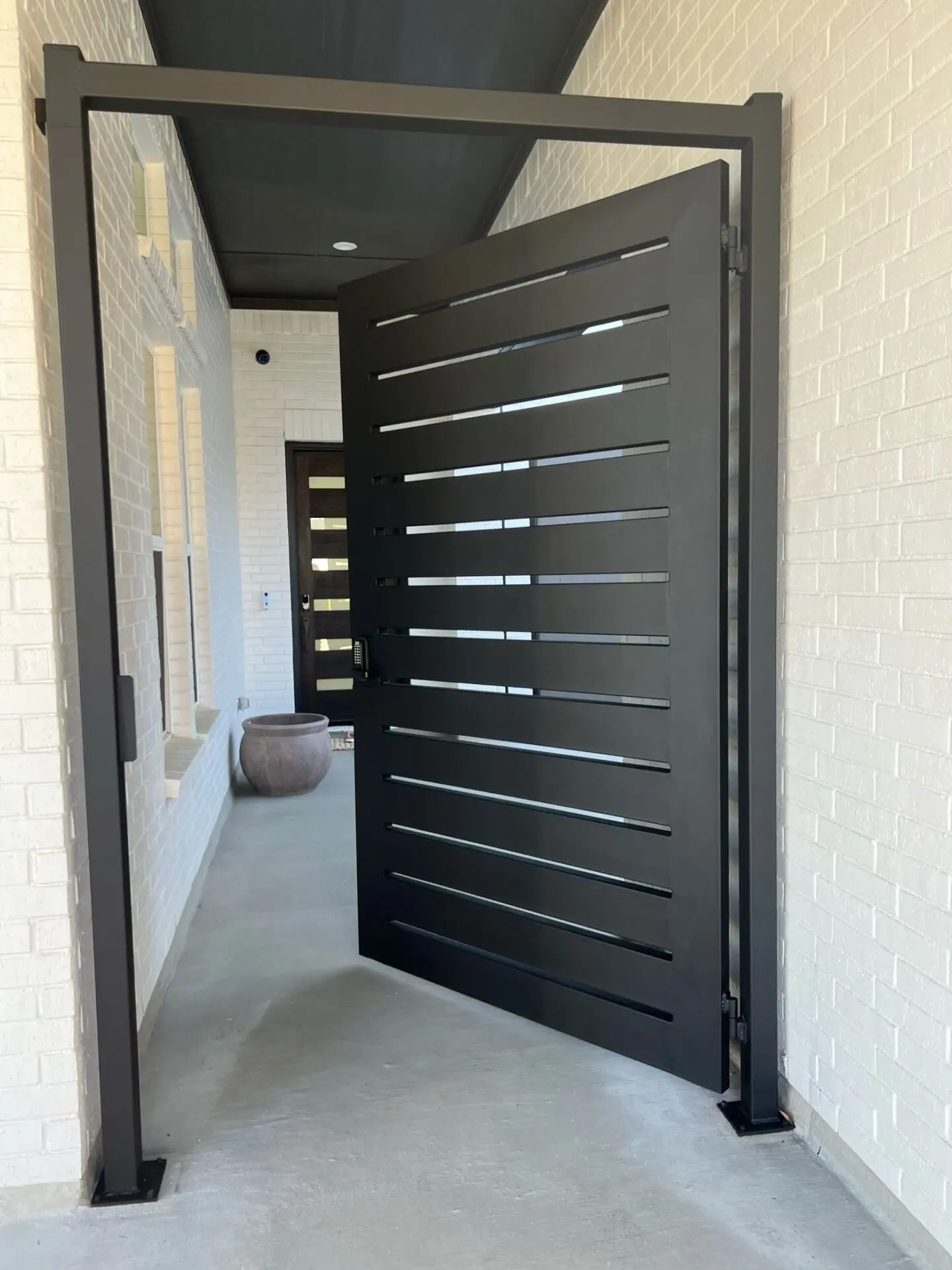 Modern pedestrian gate at a residential entry