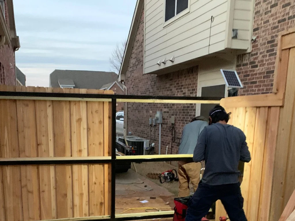 Custom wood gate installed on a residential property in San Antonio by Everlast Gates & Fence